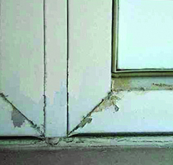 An example of a poorly maintained powder-coated aluminum surface.